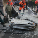 Image for article titled This Is What Happens When A Truck Full Of Crushed Stone Turns Over On A Car